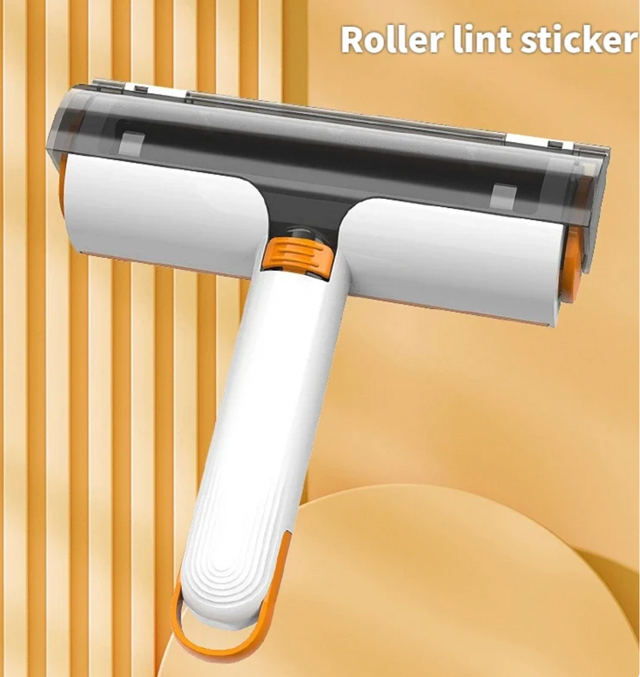 White and orange reusable pet hair roller on a warm yellow background